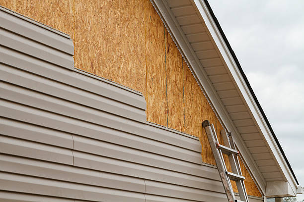Professional Siding Contractor technician working in Westlake, TX